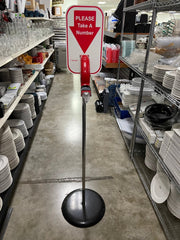 Used Microframe Turn - O - Matic Take A Number Ticket Dispenser with Floor Stand - Falcon Restaurant Supply - 1