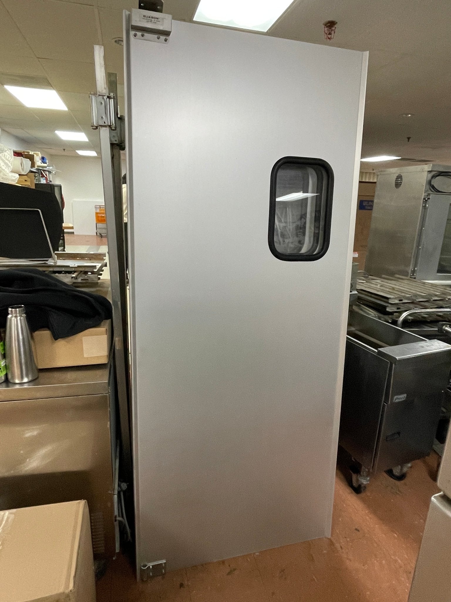 New Eliason Solid Swinging Door with Window 35.25" X 82.5" Used Hinge - Falcon Restaurant Supply - 1