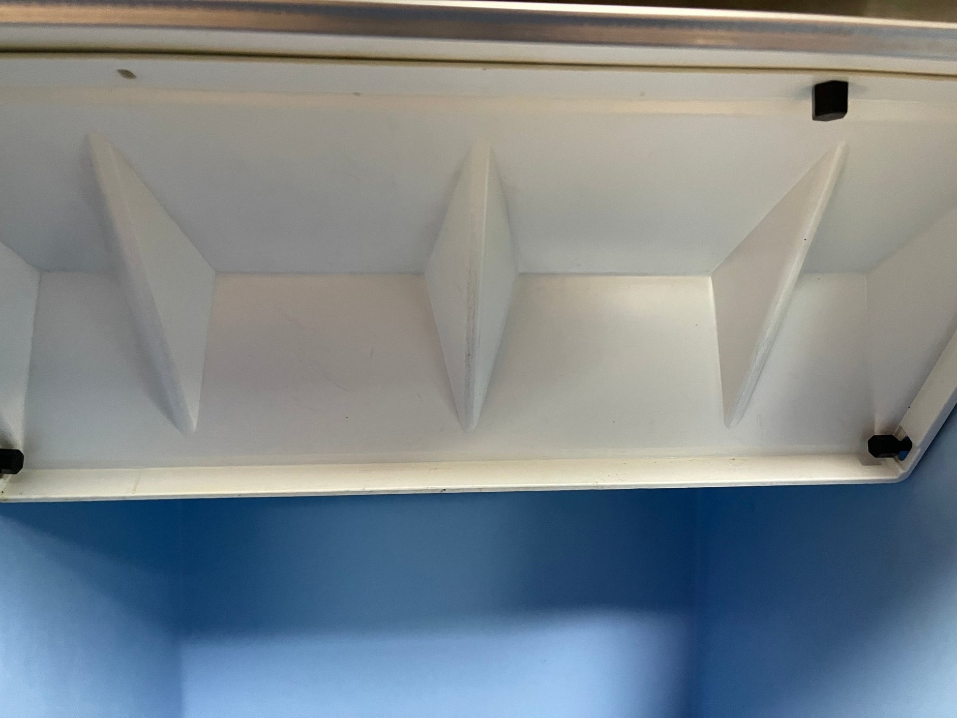 White lid of ice maker bin