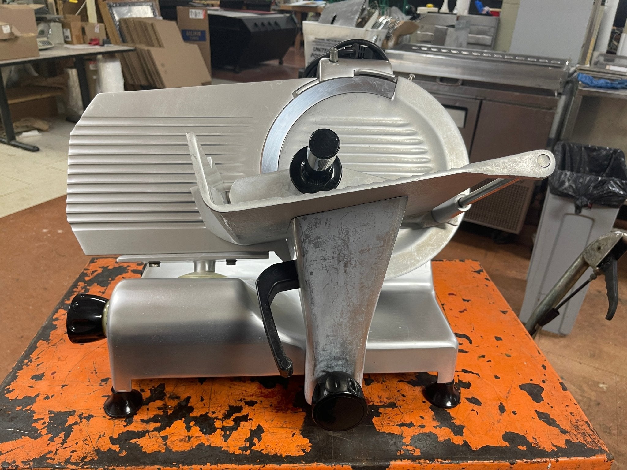 Used 12" Globe G12 Manual Gravity Feed Deli Meat Slicer - 1/2 hp - Falcon Restaurant Supply - 1