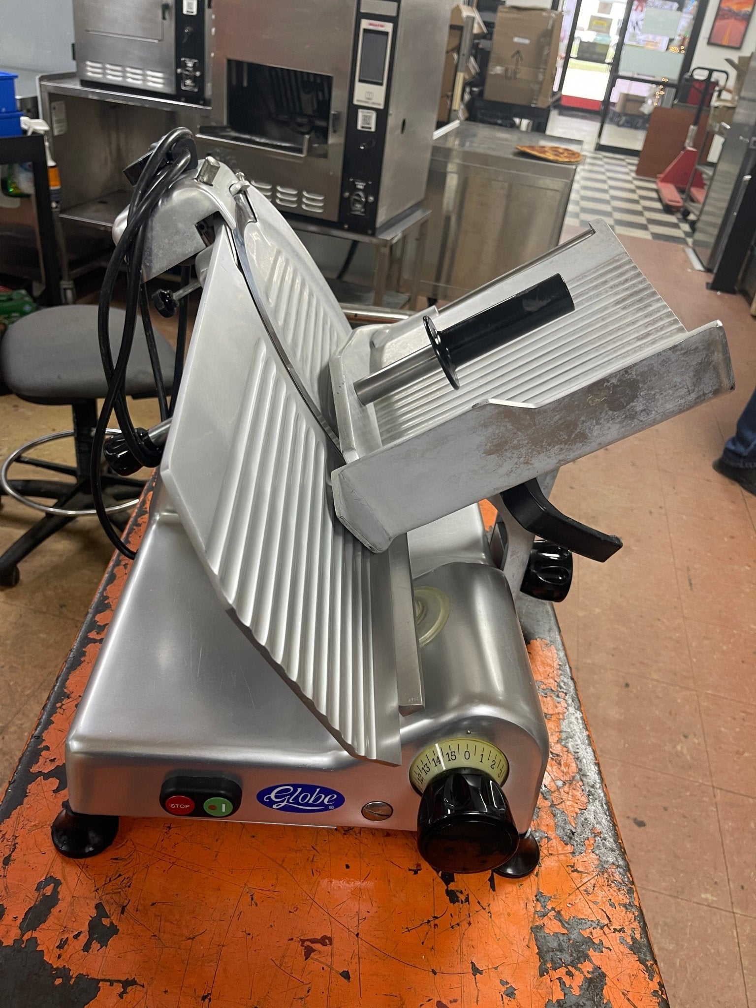 Used 12" Globe G12 Manual Gravity Feed Deli Meat Slicer - 1/2 hp - Falcon Restaurant Supply - 5