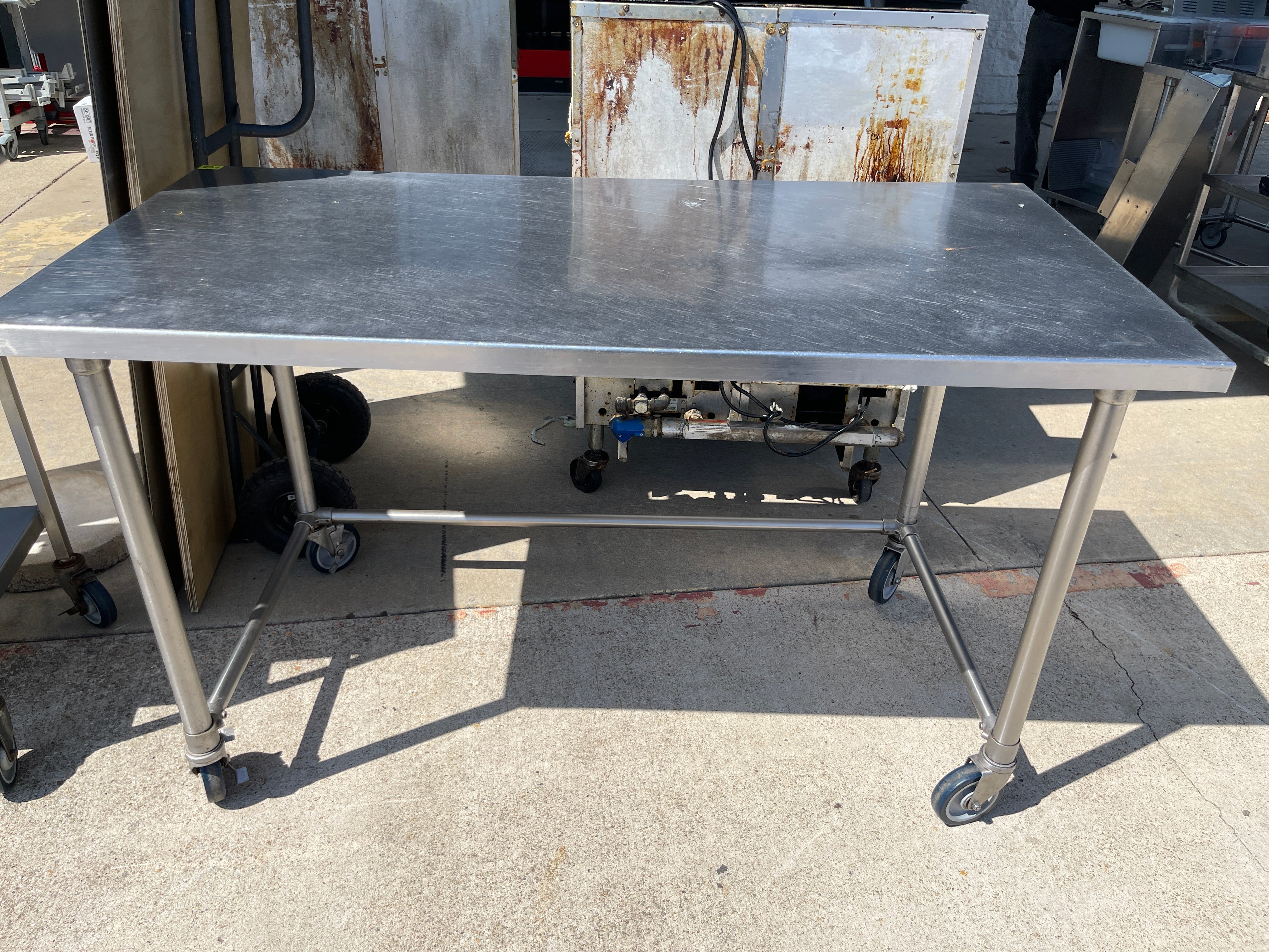 Used 60" Stainless Table with Casters - FG5 - SS346