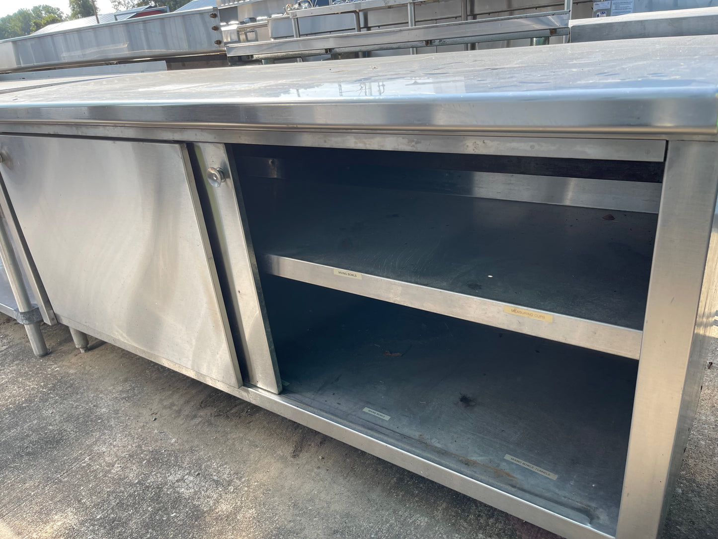 Used 72" Stainless Steel Table with Storage Shelves - SS111