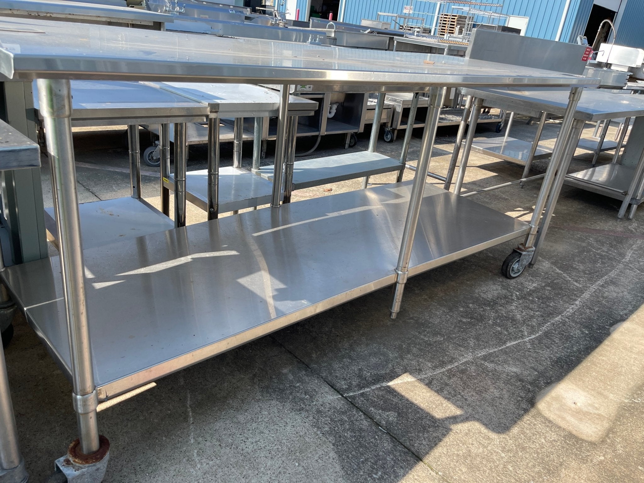 Used 96" Stainless Steel Table with Caster Wheels - SS114 - Falcon Restaurant Supply - 1