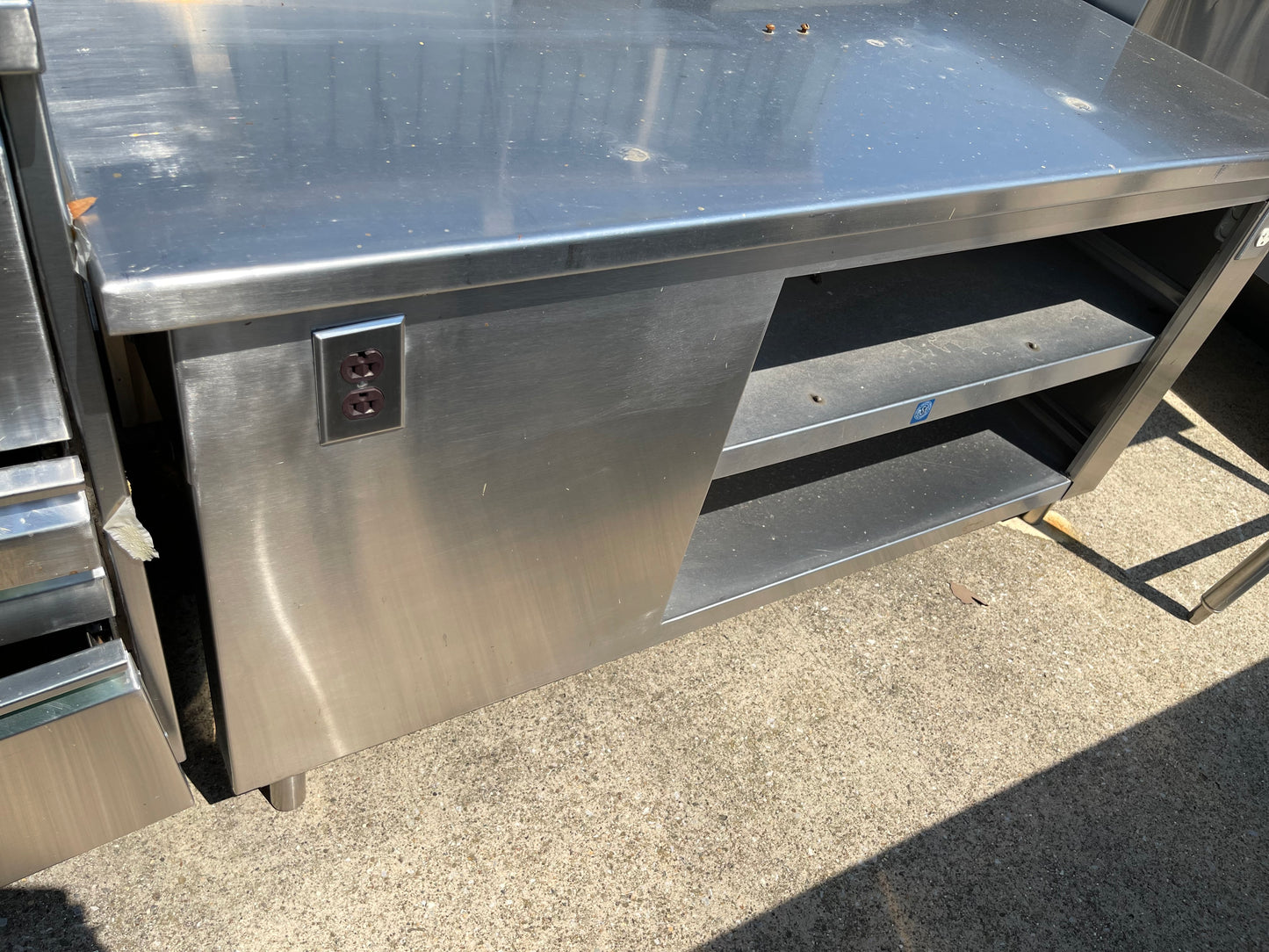 Used 61" Stainless Steel Equipment Stand with shelves and outlets - SS122