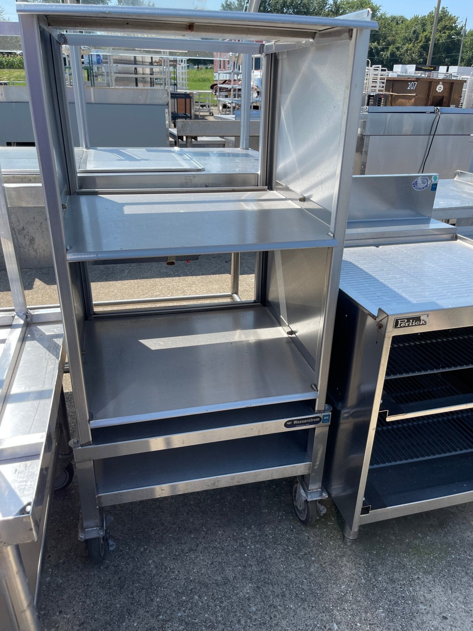 Used 25" Wasserstrom Stainless Steel Storage Shelves with Caster Wheels - SS154 - Falcon Restaurant Supply - 1