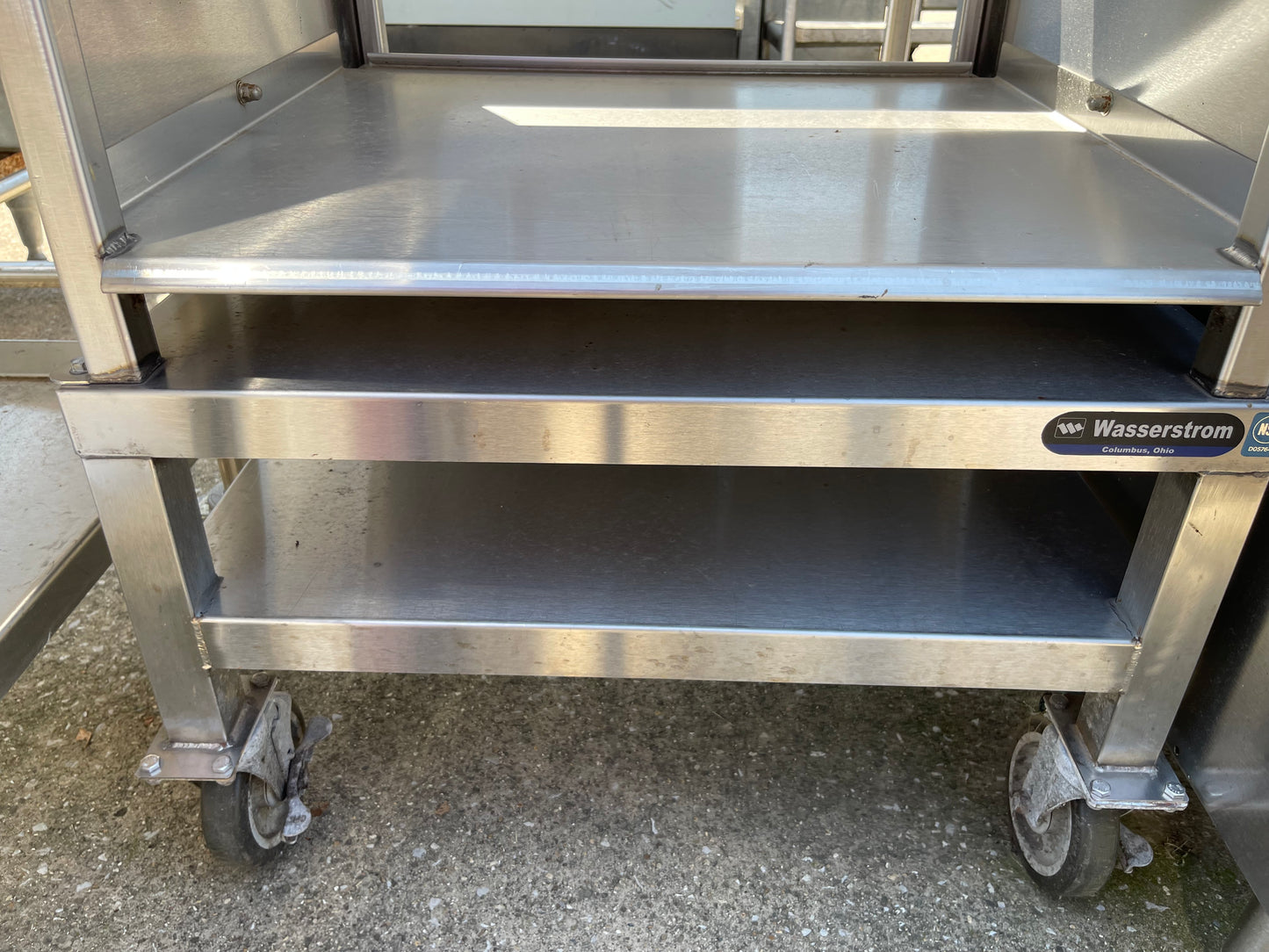 Used 25" Wasserstrom Stainless Steel Storage Shelves with Caster Wheels - SS154