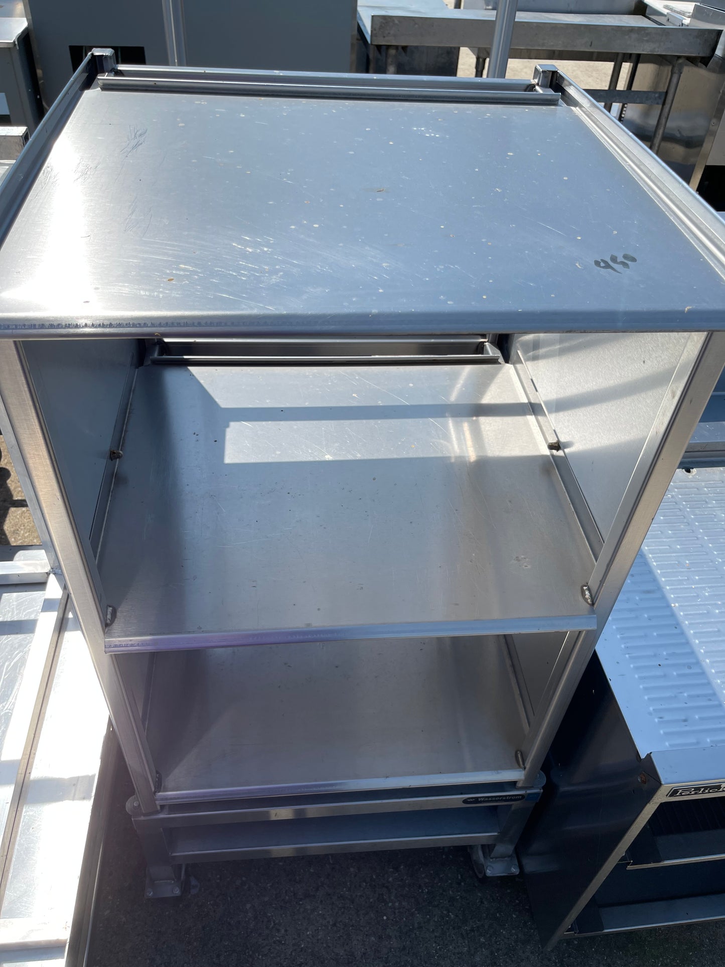 Used 25" Wasserstrom Stainless Steel Storage Shelves with Caster Wheels - SS154