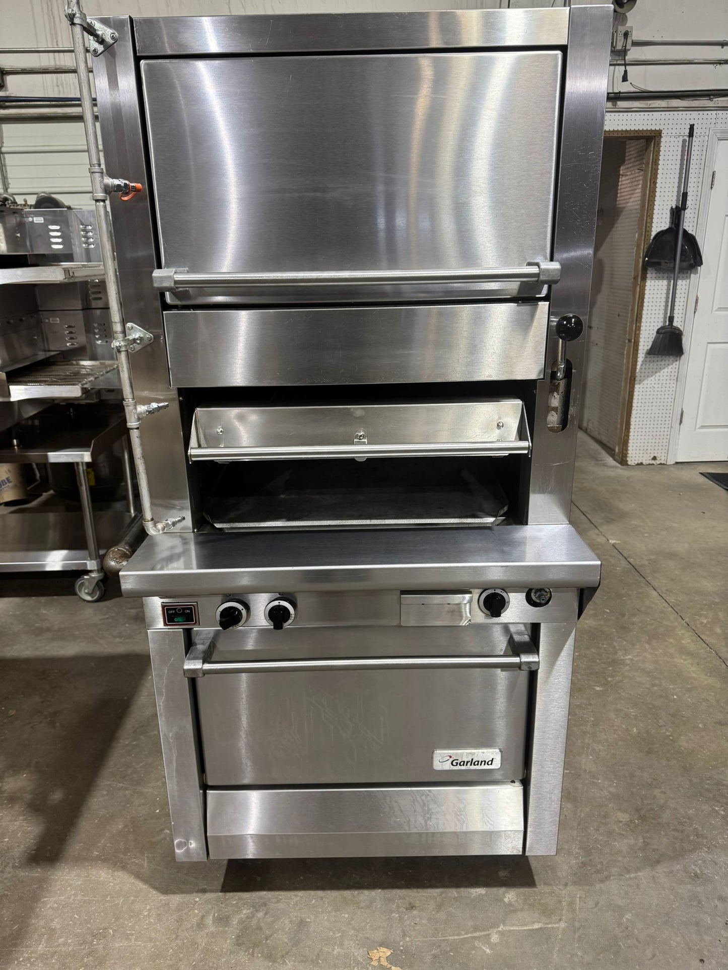 Used Garland M100XRM Upright Infrared Broiler with Standard and Finishing Ovens - 110,000 BTU NG