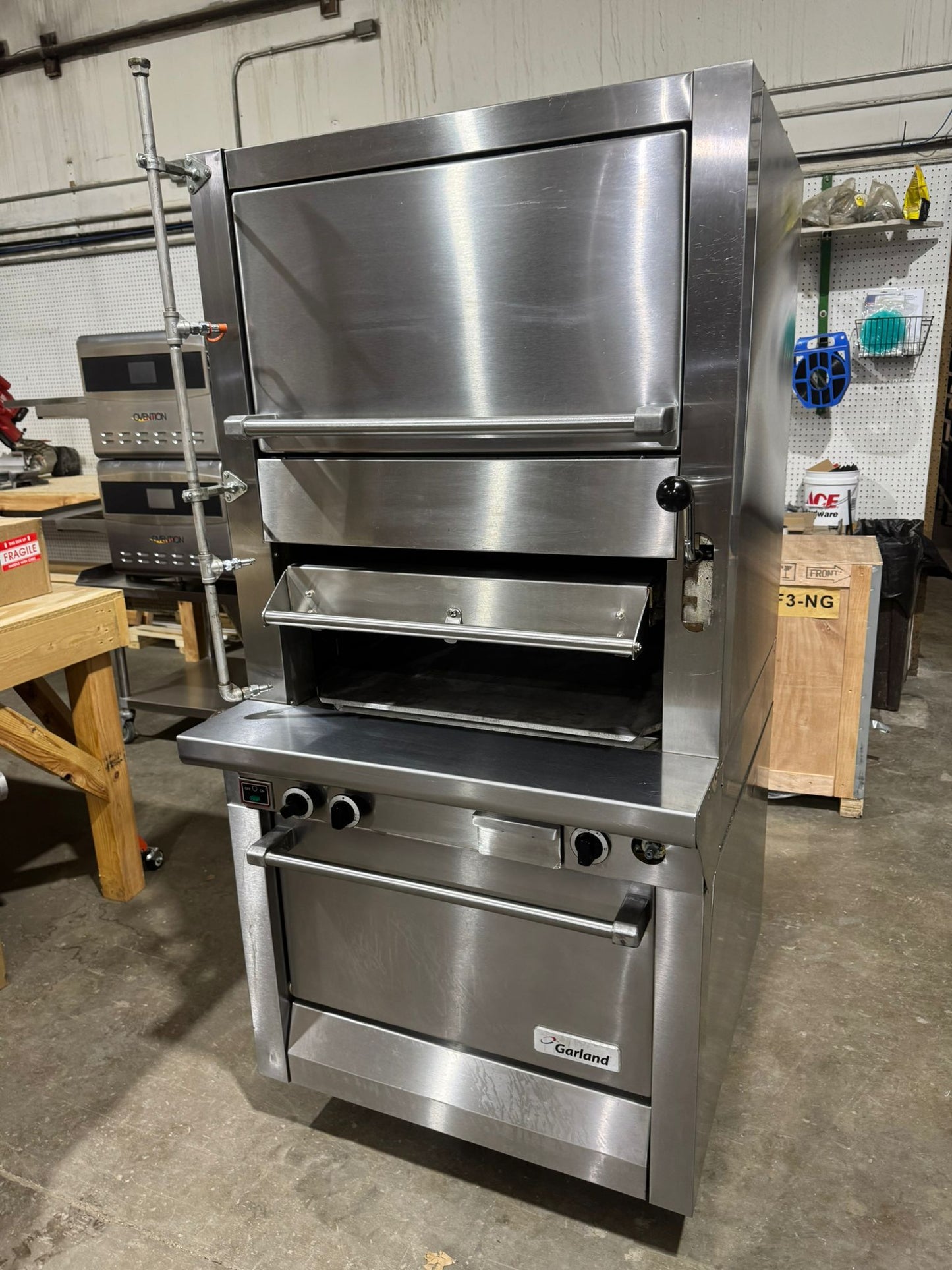 Used Garland M100XRM Upright Infrared Broiler with Standard and Finishing Ovens - 110,000 BTU NG