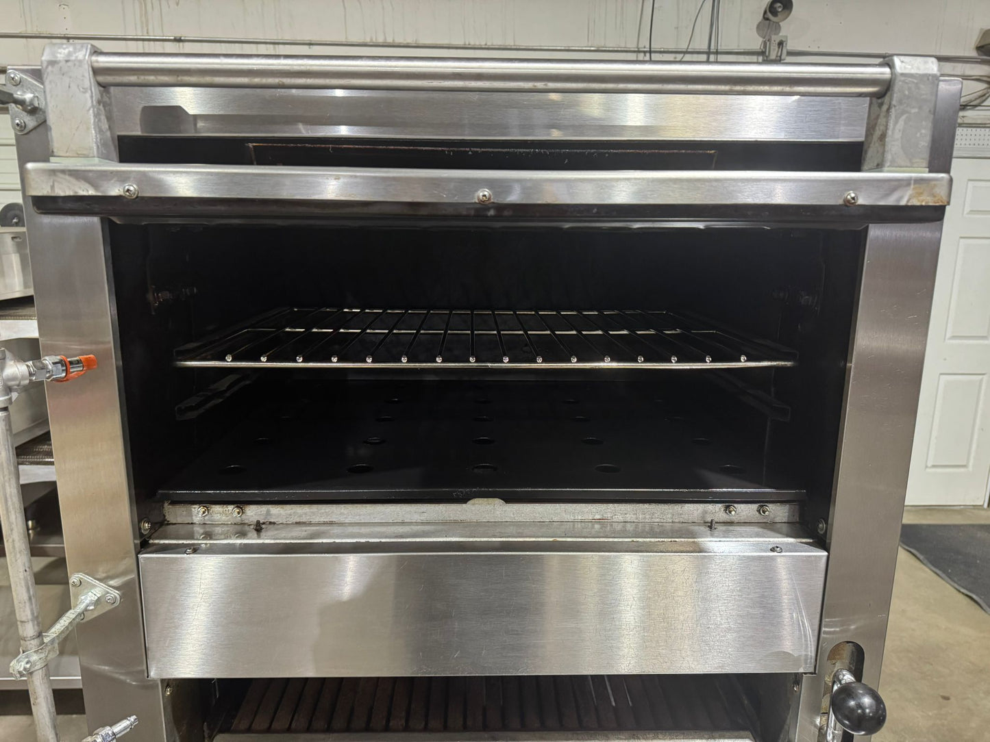 Used Garland M100XRM Upright Infrared Broiler with Standard and Finishing Ovens - 110,000 BTU NG