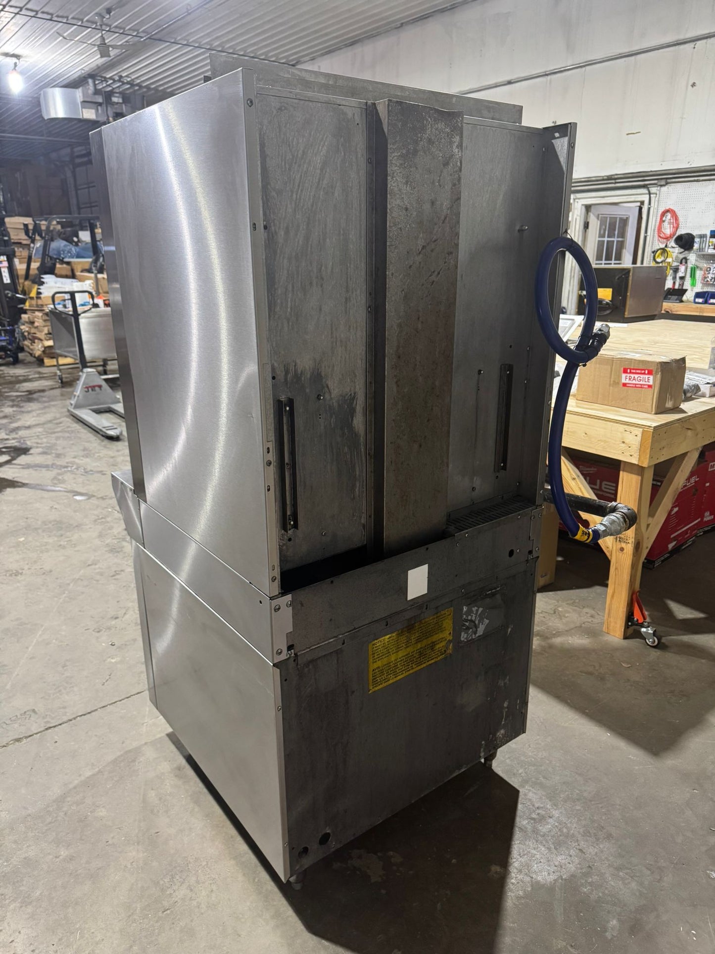 Used Garland M100XRM Upright Infrared Broiler with Standard and Finishing Ovens - 110,000 BTU NG