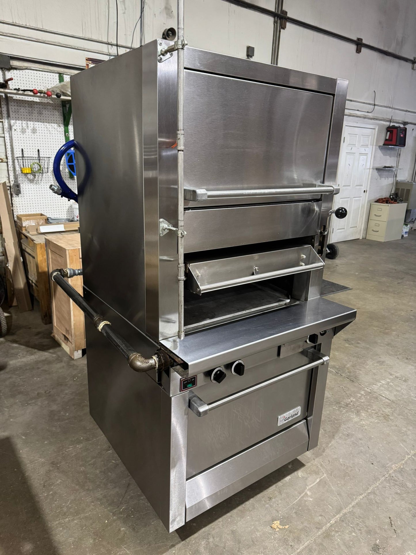 Used Garland M100XRM Upright Infrared Broiler with Standard and Finishing Ovens - 110,000 BTU NG