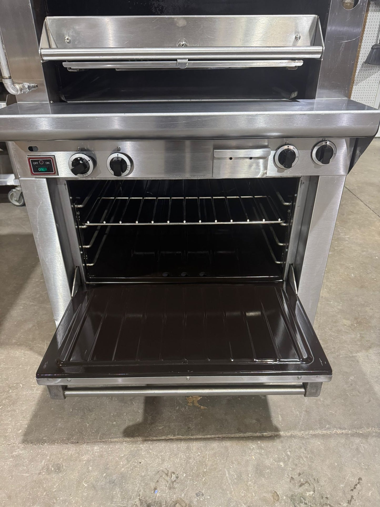 Used Garland M100XRM Upright Infrared Broiler with Standard and Finishing Ovens - 110,000 BTU NG