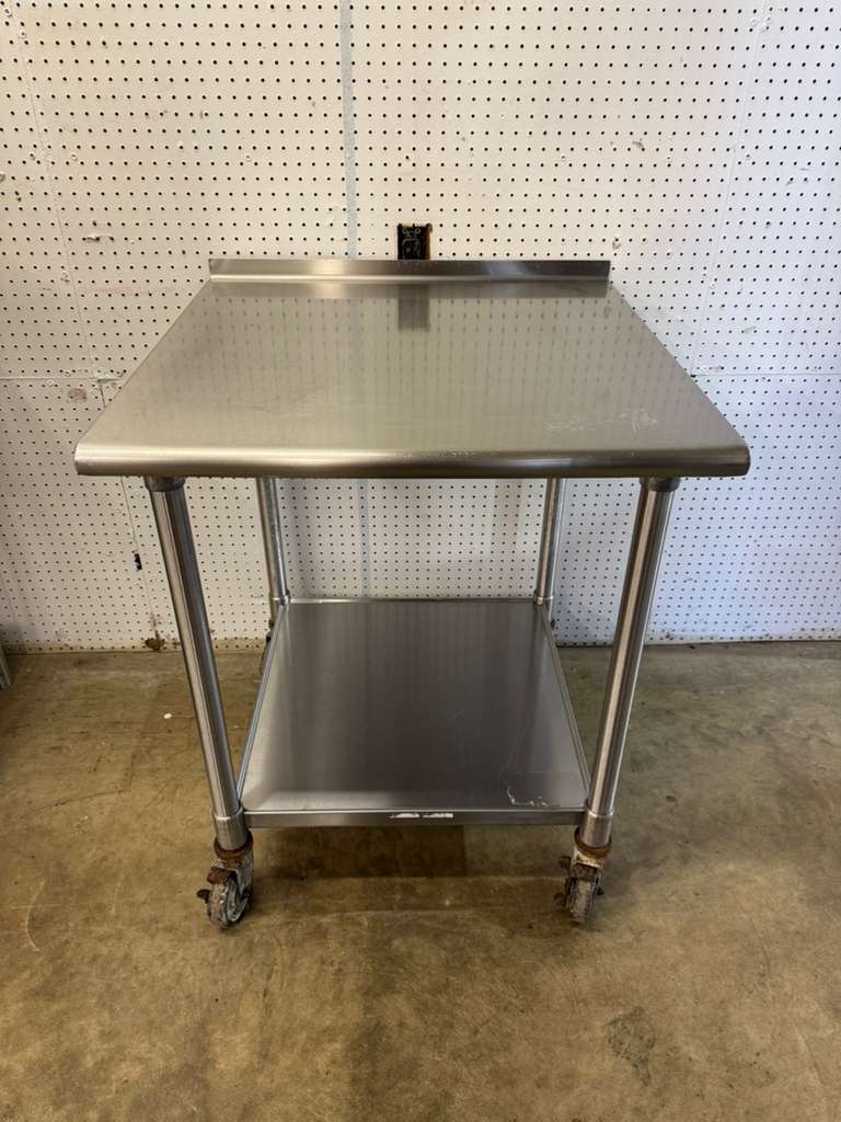 Used 30"x 30" Stainless Steel Table on Casters