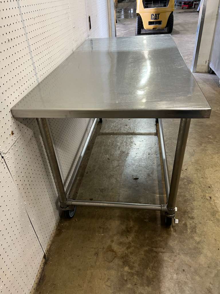 Used 60" X 30" Stainless Steel Table with Casters - FG