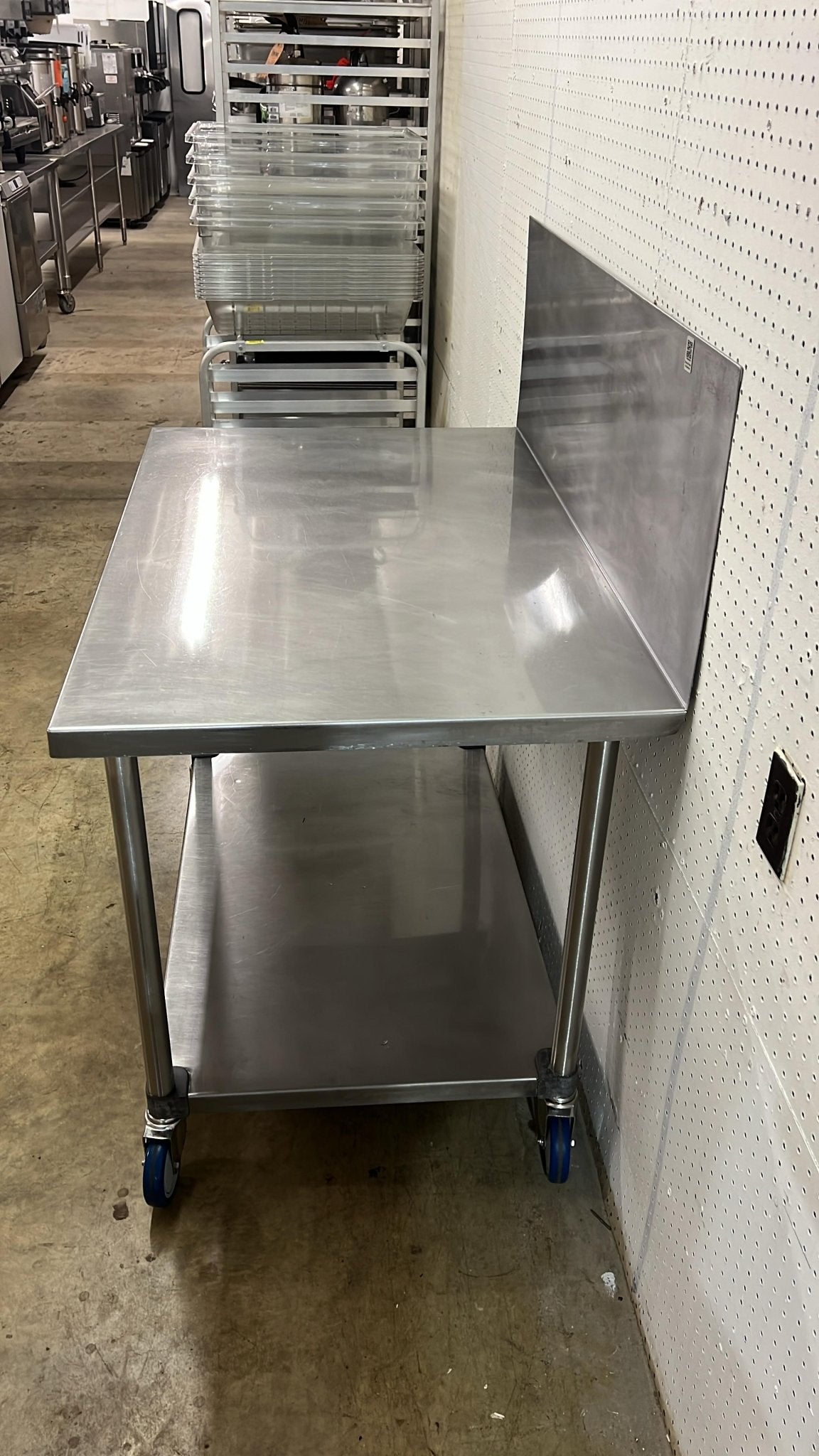 Used 48"x 30" Stainless Steel Table with Casters and a 16" Backsplash - FG - Falcon Restaurant Supply - 2