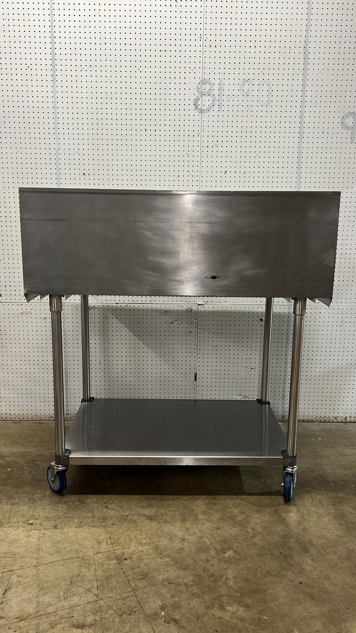 Used 48"x 30" Stainless Steel Table with Casters and a 16" Backsplash - FG - Falcon Restaurant Supply - 4
