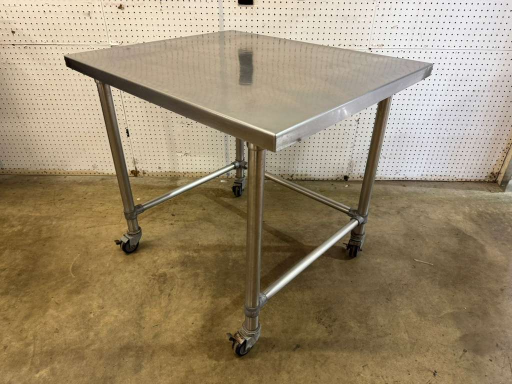Used 36"x 30" x 31.75" Stainless Table with Casters - FG