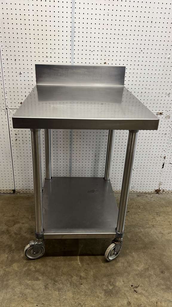 Used 24" X 30" Stainless Steel Table with Shelf and Casters