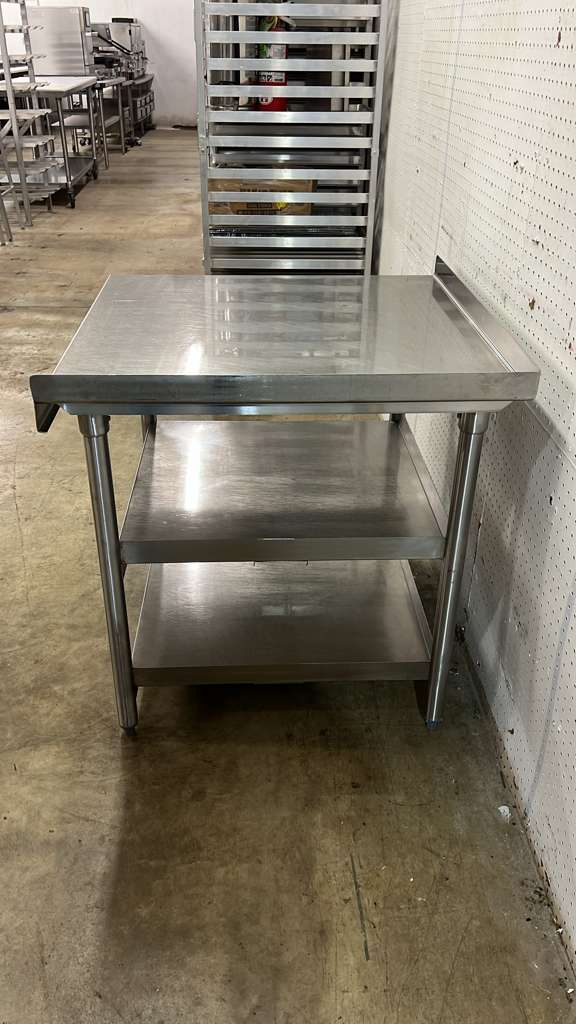 Used 33" x 32" Stainless Steel Table with Shelves - RL