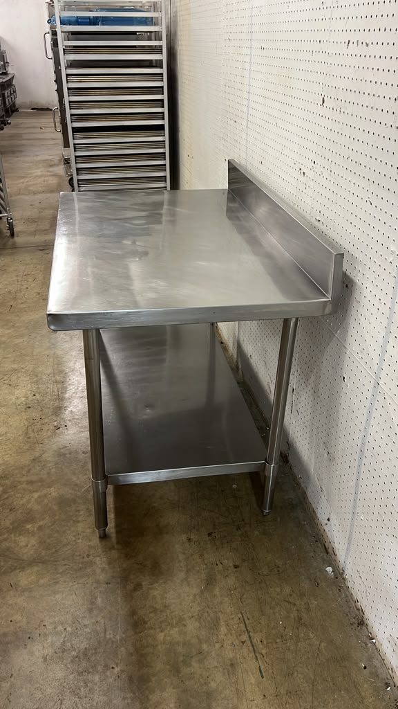 Used 48" x 30" Stainless Steel Table - TH6