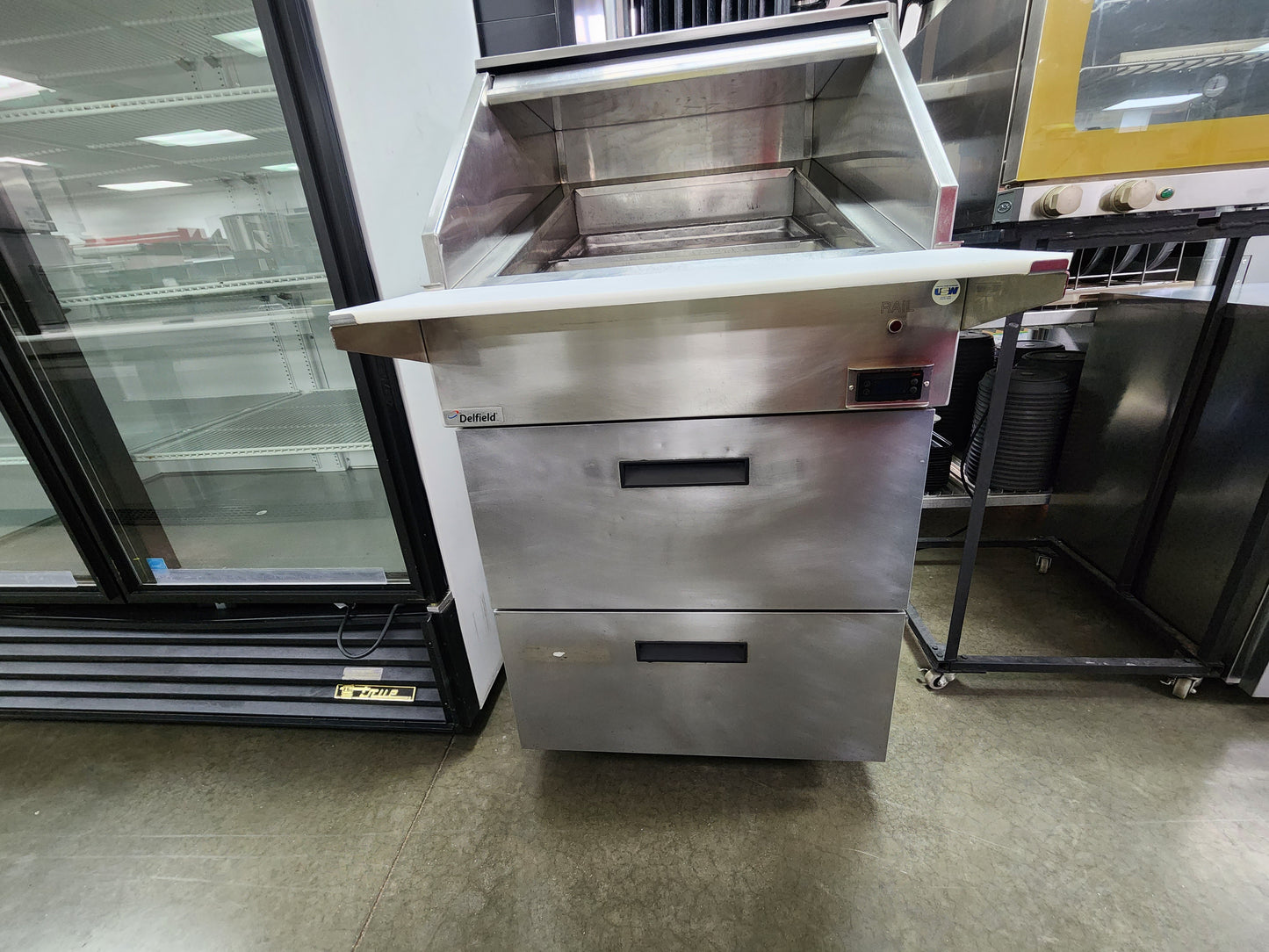 Uses 27" Delfield 18MC27P-BI  Refrigerated Prep Table with 2 Drawers