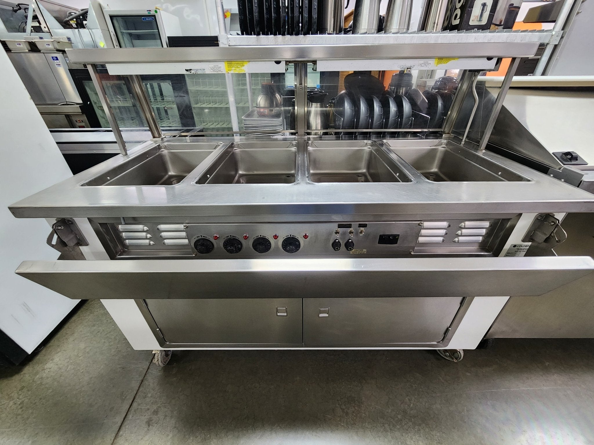 Used Colorpoint 5E4 - CPA - 4 Open Well Steam Table with folding service shelves on each side - Falcon Restaurant Supply - 1