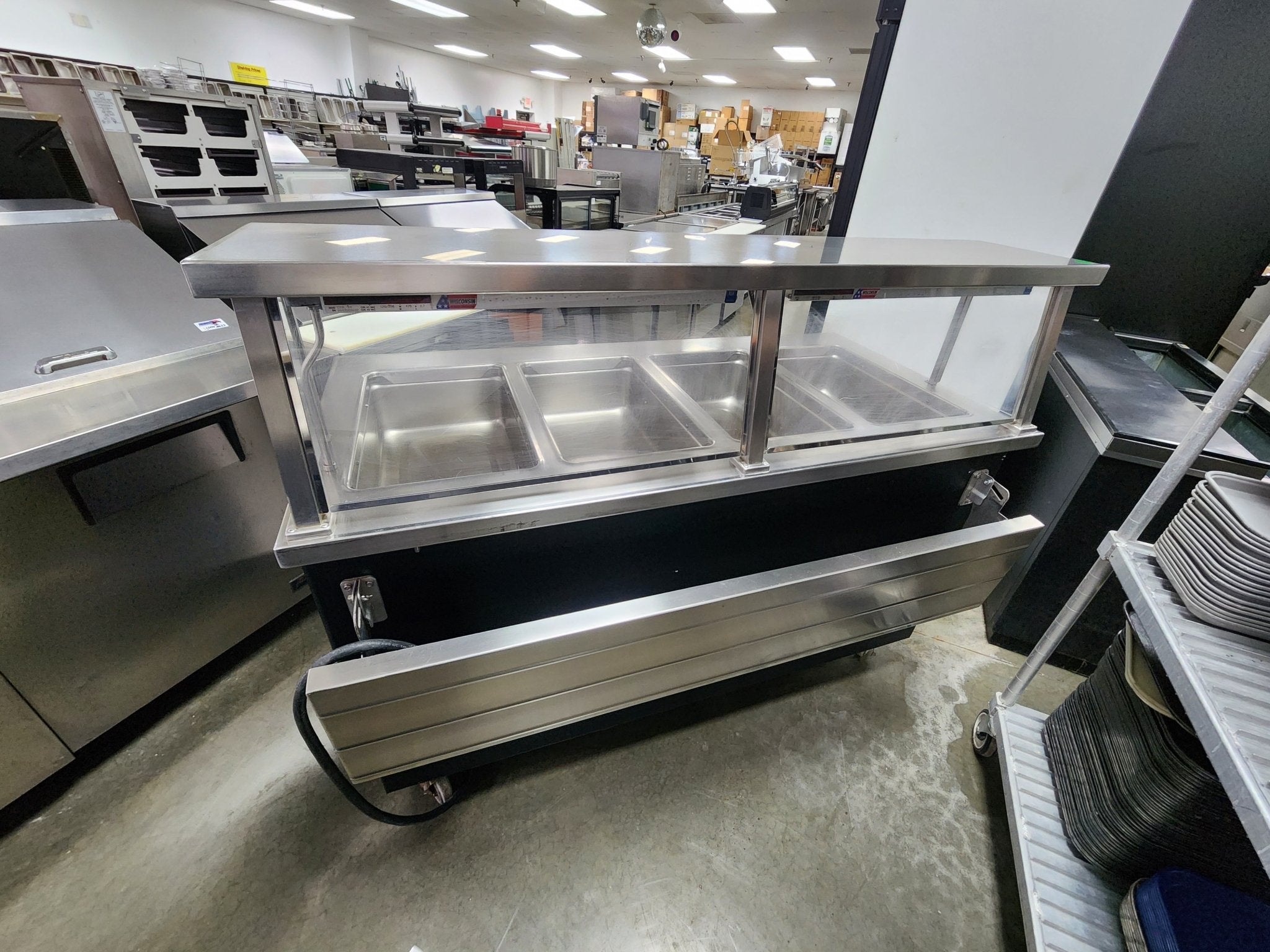 Used Colorpoint 5E4 - CPA - 4 Open Well Steam Table with folding service shelves on each side - Falcon Restaurant Supply - 4