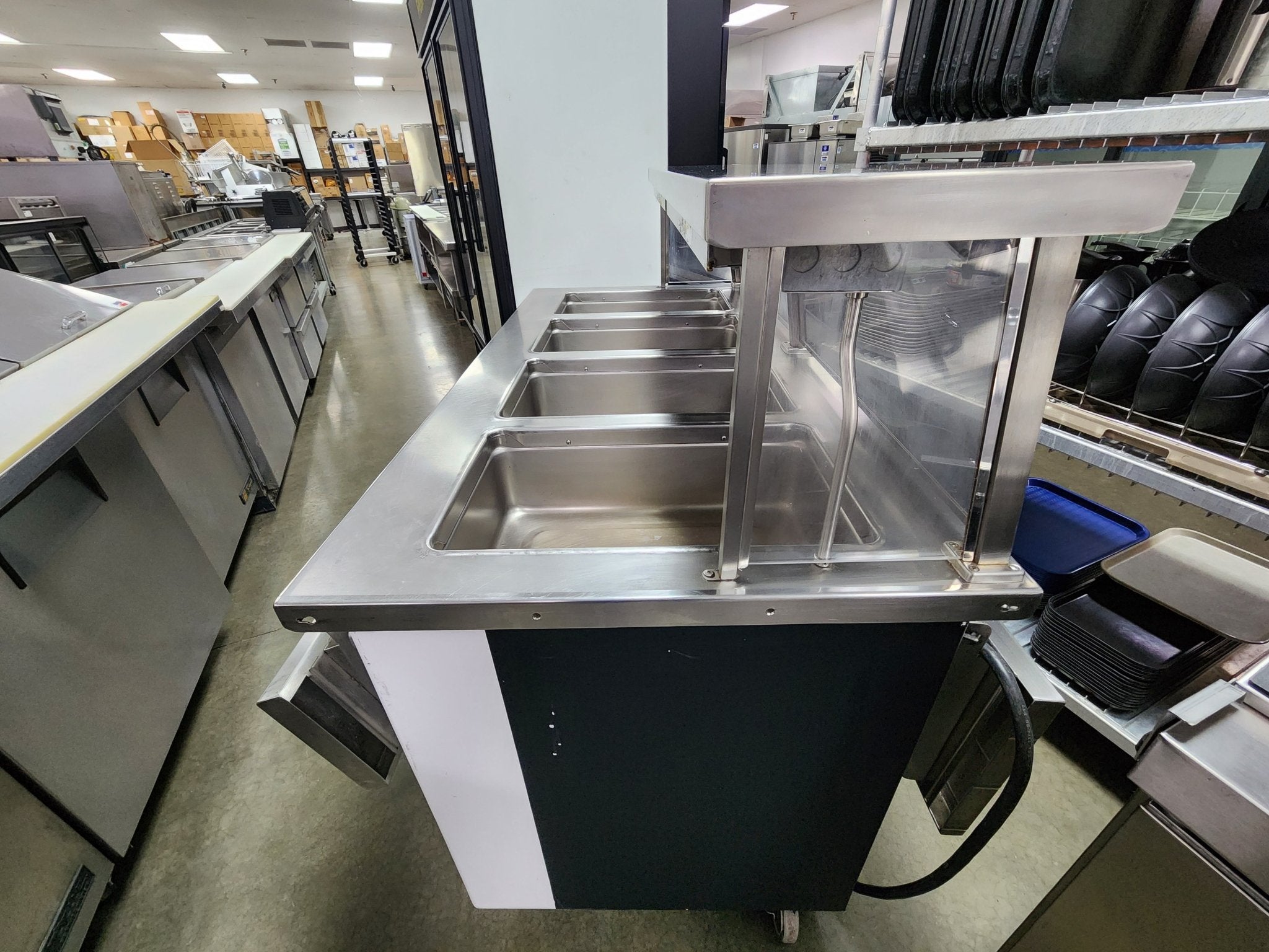 Used Colorpoint 5E4 - CPA - 4 Open Well Steam Table with folding service shelves on each side - Falcon Restaurant Supply - 5