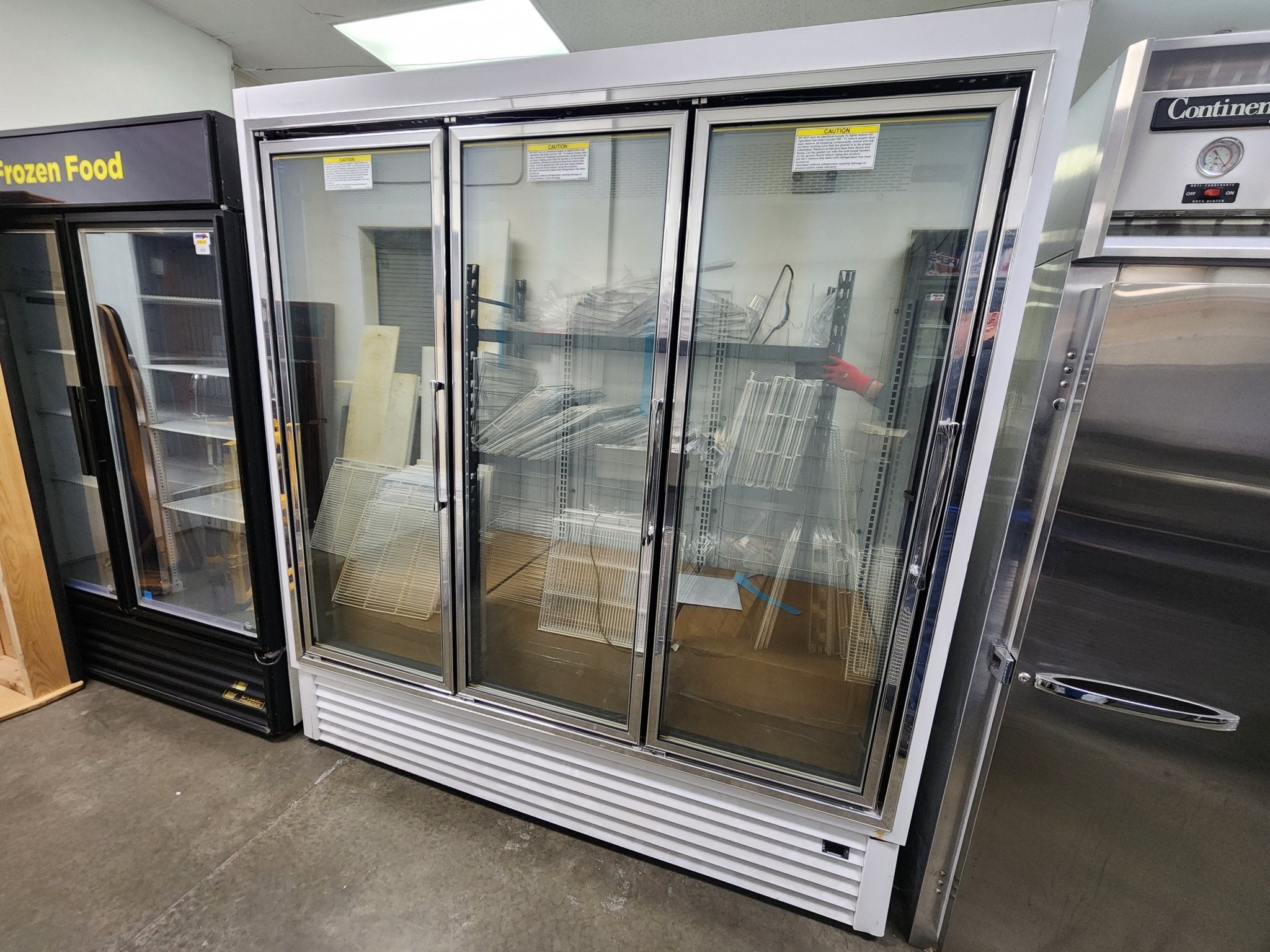 Used Hussmann HGL-3-BS 3 Door Reach-In Cooler Merchandising Freezer