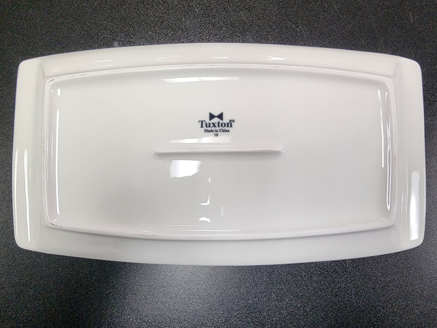 New Tuxton AMU-556 AlumaTux Pearl White (European White) 13 3/4" x 7 1/2" China Plate - 12/Case